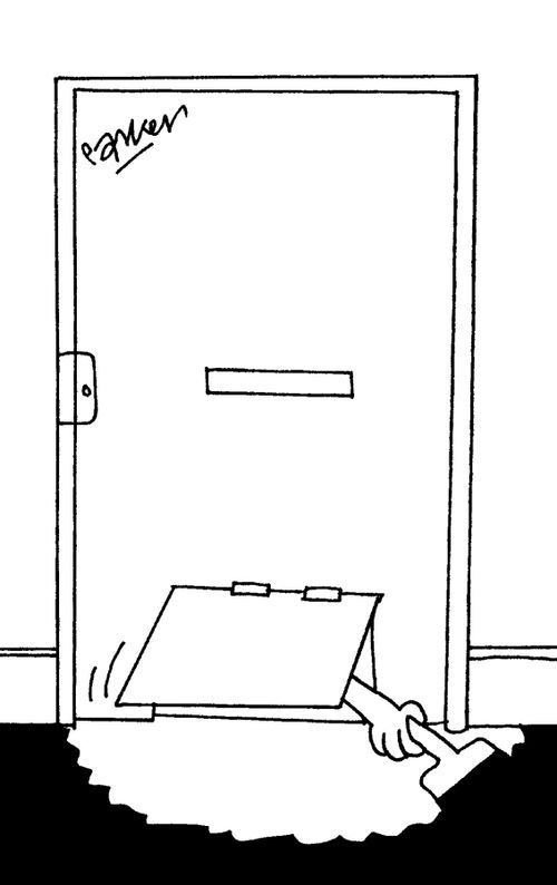 Man finishing painting through flap in door.