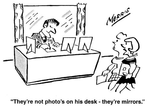 "They're not photos on his desk - they're mirrors."