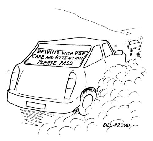 Sign in car reads: 'Driving with due care and attention.  Please pass.'