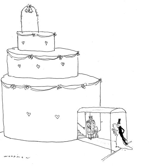 Bride and Groom Cake Toppers Entering Cake.