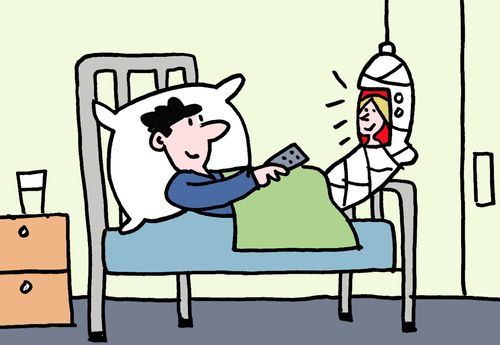 Man in hospital watching television in his cast.