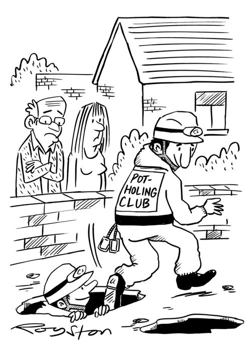 Potholers emerge from potholes in road.