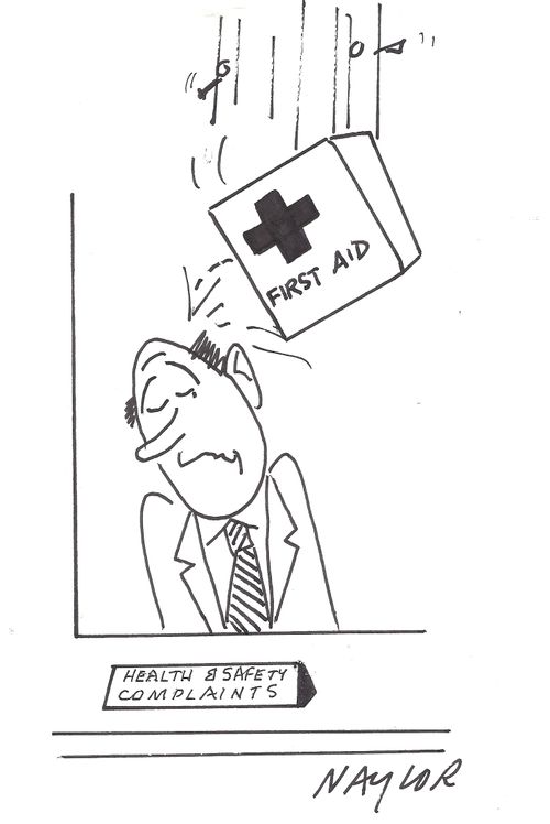 Health and safety man is hit in the head by the first aid kit.