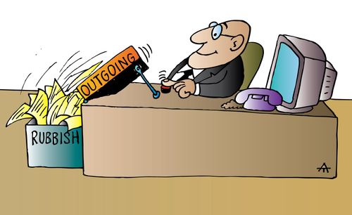 Man tips the contents of his outbox into the bin.