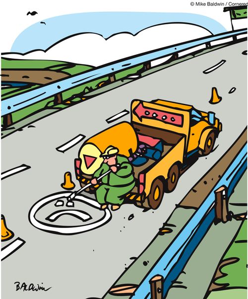 Root worker painting a unhappy face on the road.