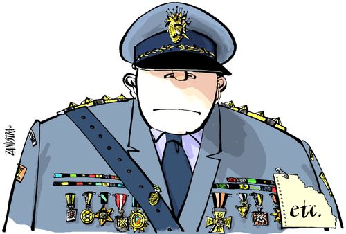Military officer with 'etc' pinned to his jacket.
