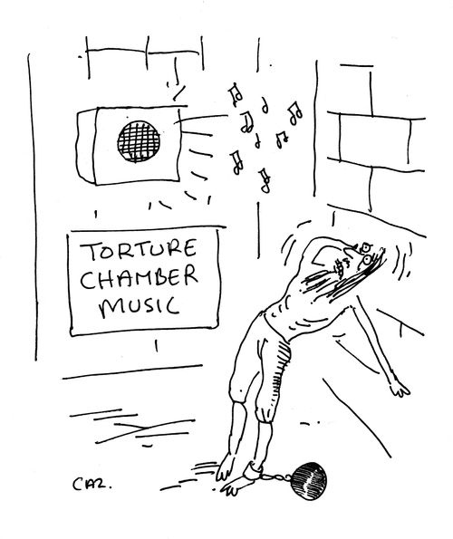 Man being played music in a tortue chamber.