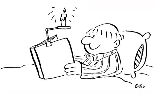 Monk reads in bed using night light candle clipped to book.