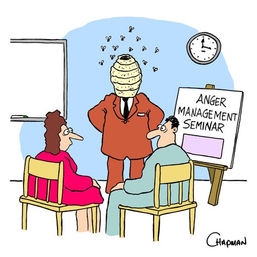 Man demostrates Anger Management with Hornets nest on head.
