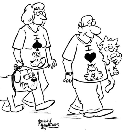 Man wears shirt: 'I Love My Cat'  Woman wears shirt, 'I spade my Dog'.