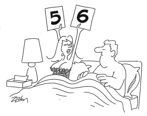 Woman rating a man's performance with scorecards.
