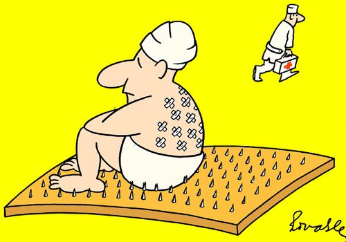 Fakir with plasters on his back.