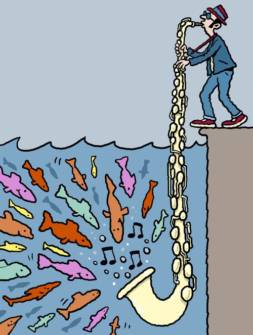 Musician plays long saxophone immersed in the sea to attract music loving fish.