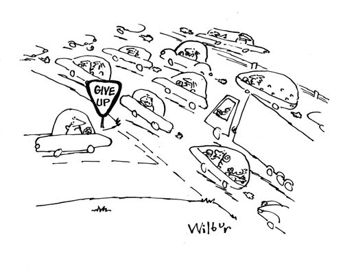 Road sign at busy junction reads: 'Give Up'.