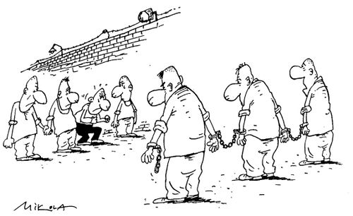 Man getting angry as all other prisoners are either chained together or holding hands