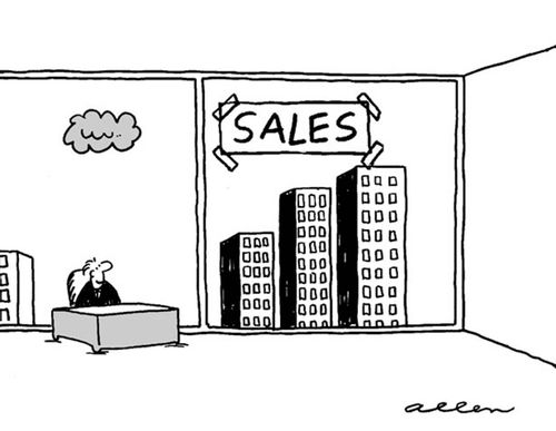 Sales chart is buildings in background.