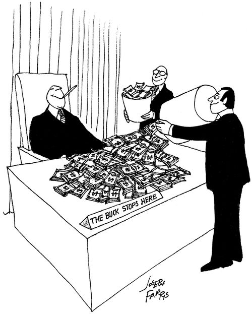 Cash being poured onto an executive's desk.
