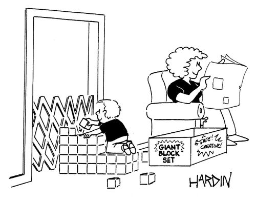 Child using building blocks to get over a baby gate.