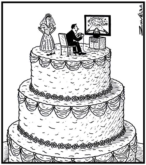 Wedding cake figurines has a husband playing a video game.