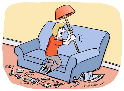 Woman retrieving many items from a sofa, including a standard lamp.