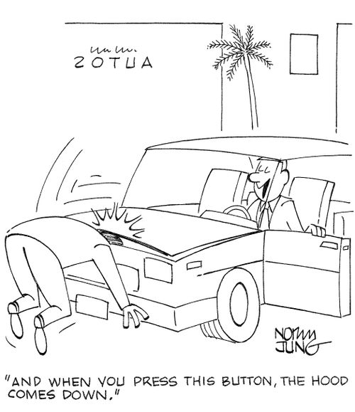 'And when you press this button, the hood comes down.'