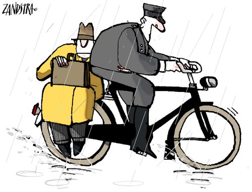 Man riding on back of bike.