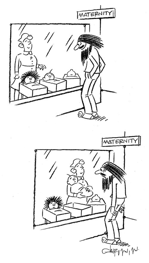 Hairy father with a bald baby.
