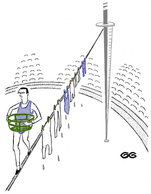 Tightrope walker hanging out his washing.