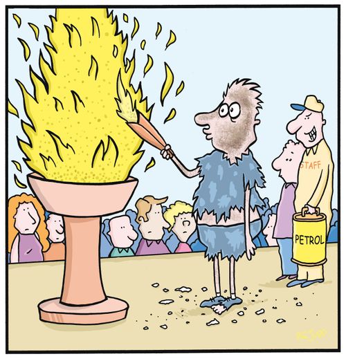 Torch Bearer burnt from exploding flame. Staff behind him with petrol can used to fuel up flame.