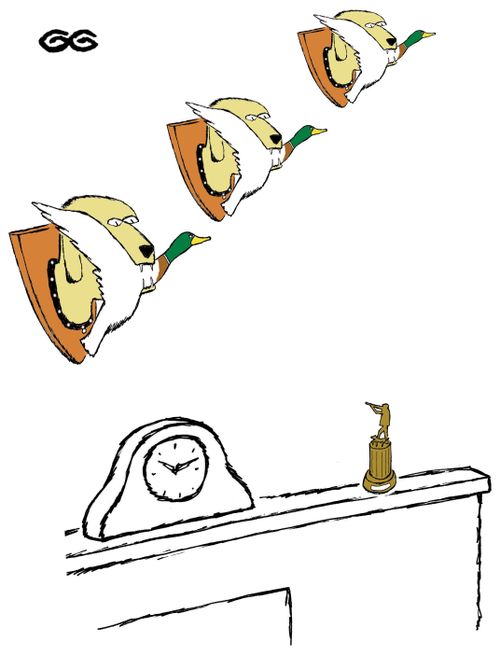 Three gun dogs holding ducks in their mouth as ornaments on the wall.