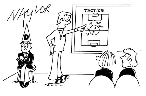 PE teacher teaching football tactics. Boy sat in corner with dunce cap.