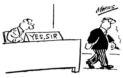 Desk sign: "Yes, sir"
