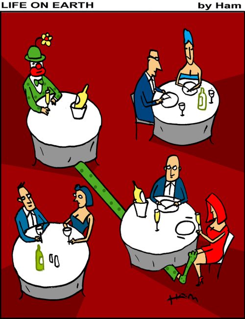 Clown playing footsie in restaurant.