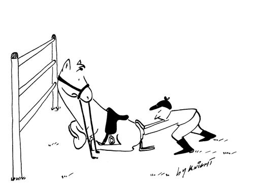 Jockey trying to push a horse over a jump.