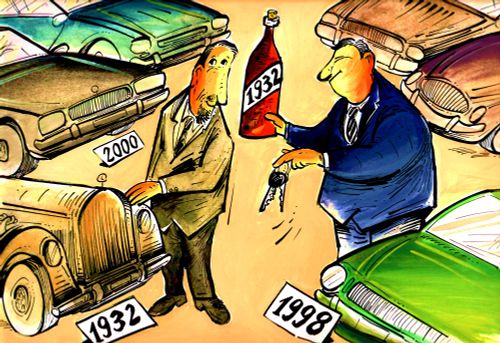 Man offers 1932 bottle of win and car keys to man with classic 1932 car.