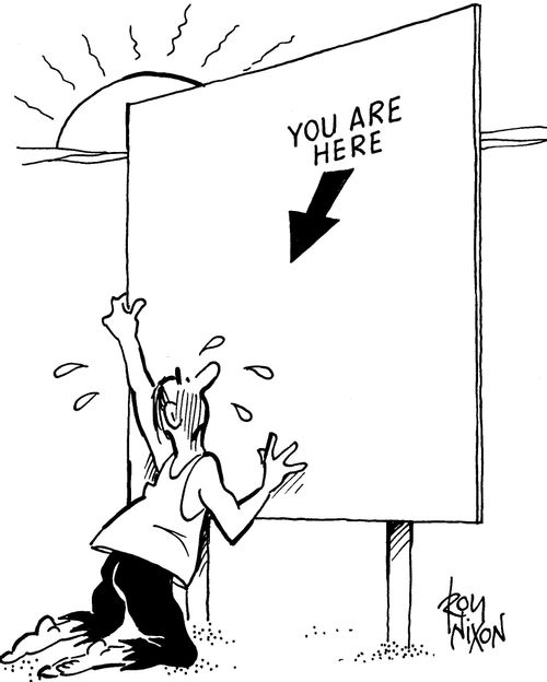 'You Are Here' sign in desert.