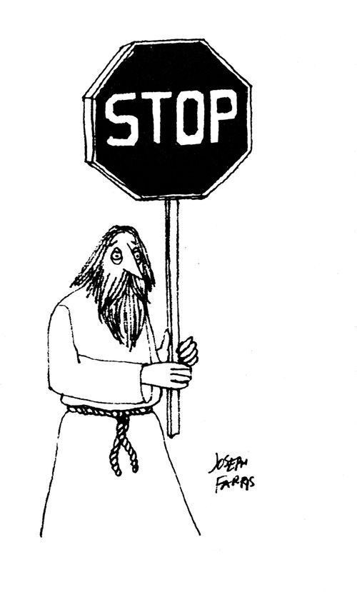 Man holding a stop sign.