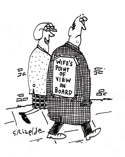 Man with sticker on back reading 'Wife's point of view on board'