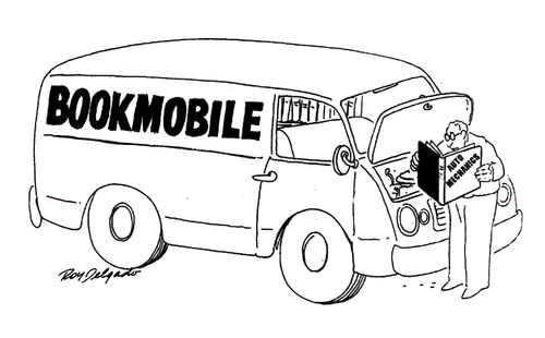 Driver of Bookmobile reading book on mechanics