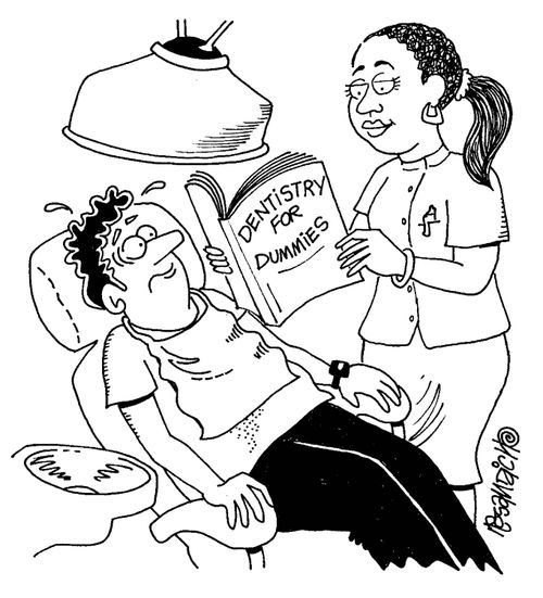 Dentist reading 'Dentistry for Dummies'.