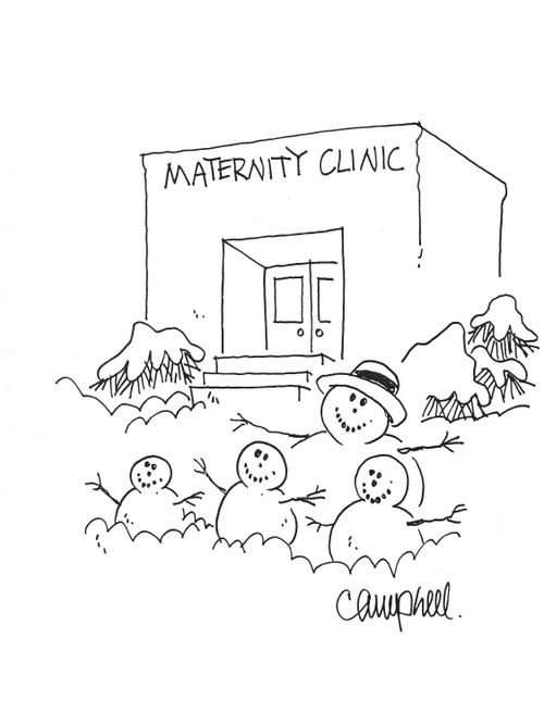 Snow family in front of maternity clinic
