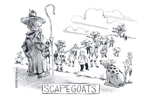 Shepherd standing watch over herd of scapegoats.