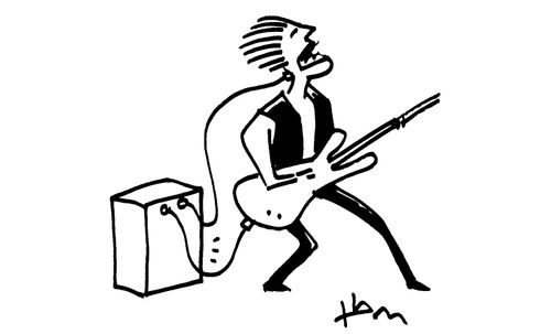 Musician plugged into amp.