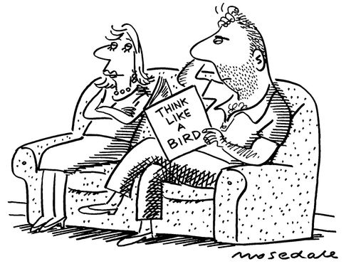 Man trying to understand women by reading book.