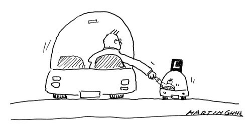 Man helping a mini learner driver