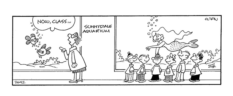 'Now class...' says teacher looking at fish while the children are all staring at a mermaid in the next tank. 