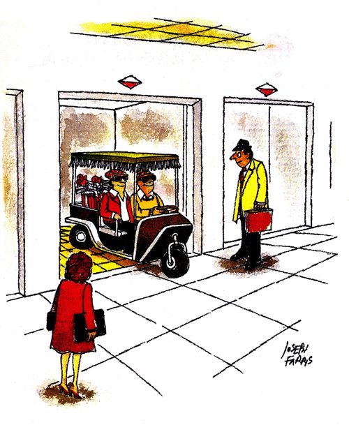Couple leave an elevator in a golf buggy.