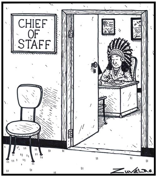 Chief of Staff A North American Indian working away in an office.