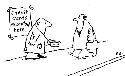 Beggar on street with sign 'Credit cards accepted here'.