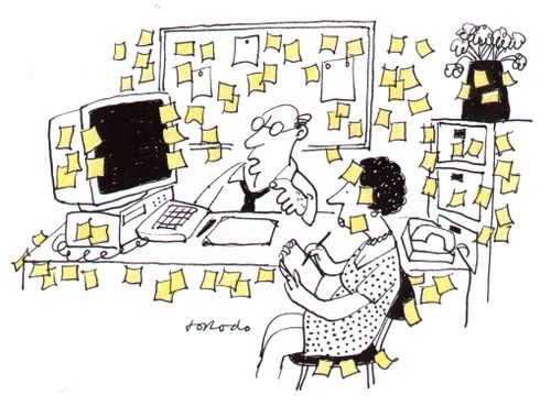 Office covered in post-it notes.